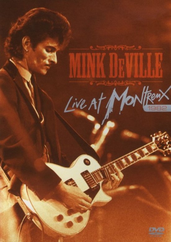 Mink Deville, Live At Montreux 1982 DVD-cover met artiest die gitaar speelt.