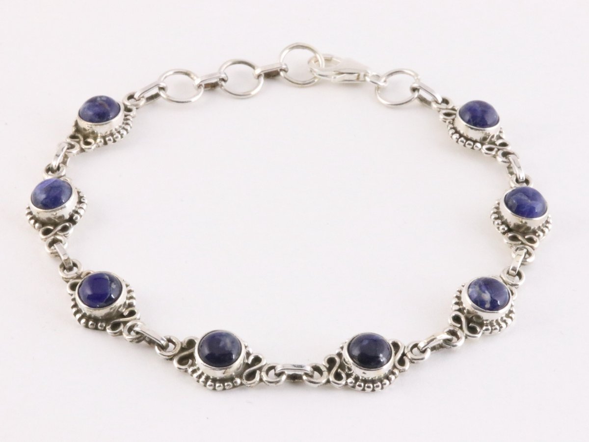 Bewerkte zilveren schakelarmband met sodaliet