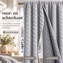 Grijze gordijnen met zachte fleece voorkant en gewatteerde blackout achterkant voor isolatie.