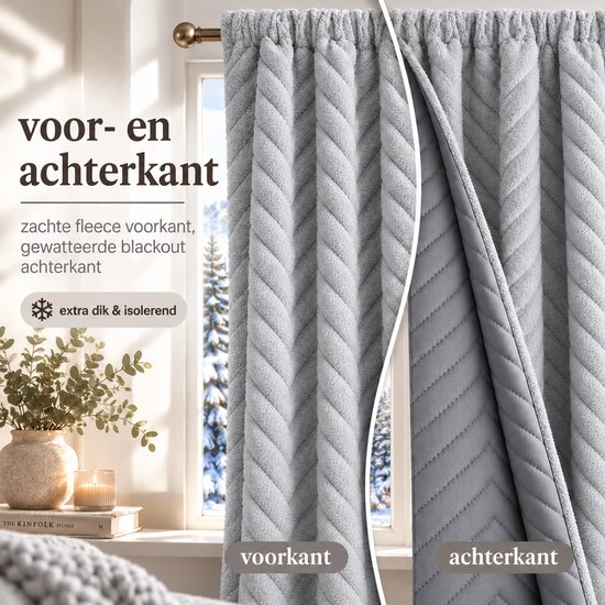 Grijze gordijnen met zachte fleece voorkant en gewatteerde blackout achterkant voor isolatie.