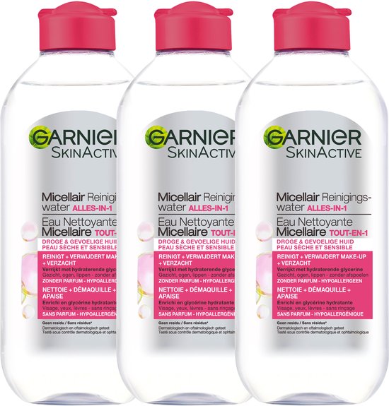 Drie flessen Garnier SkinActive micellair reinigingswater, 400 ml per stuk, met rode dop en het Garnier logo.