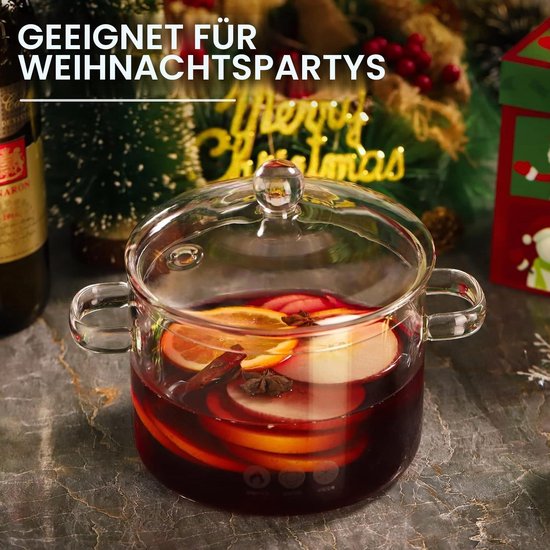 Glazen pan met glühwein, sinaasappelschijfjes en steranijs, met tekst 'Geschikt voor kerstfeesten'.