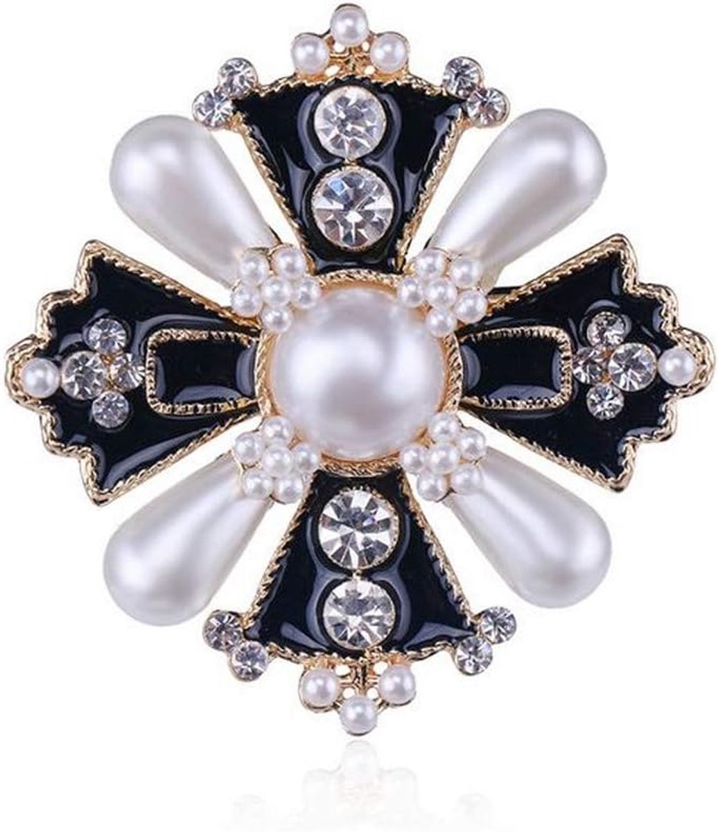 Broche van staal in kruisvorm, zwart en goudkleurig, parelmoer-parels
