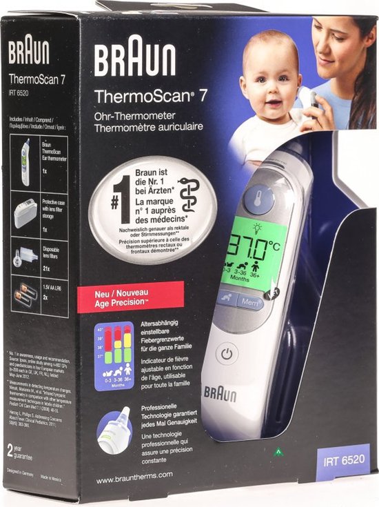 Doos van Braun Thermoscan 7 oorthermometer met afbeelding van baby en moeder. Bevat thermometer, opbergdoos en lensfilters.