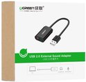 Doos van UGREEN USB 2.0 externe geluidskaart adapter met afbeelding van adapter en poorten.