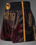 Zwarte Muay Thai shorts, zijkant met "VENUM" tape en rode Quetzal Fury print.