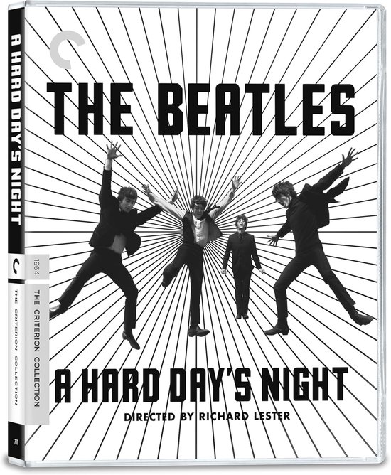 The Beatles in zwart-wit, springend en dansend, met de titel A Hard Day's Night.