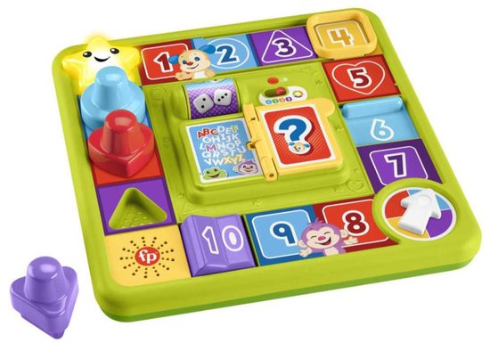 Groen Fisher Price speelbord met nummers, vormen, een ster met gezichtje en draaibare kaarten. Een paarse vorm ligt ernaast.