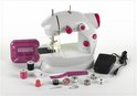 Witte en roze kindernaaimachine met metalen opbergdoosje met 'Fashion Passion' logo, accessoires.