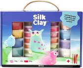 Boîte d'argile de modelage 'Silk Clay', avec 18 pots, 10 pots de 14g et 1 pot de 40g. Avec de petites figurines.