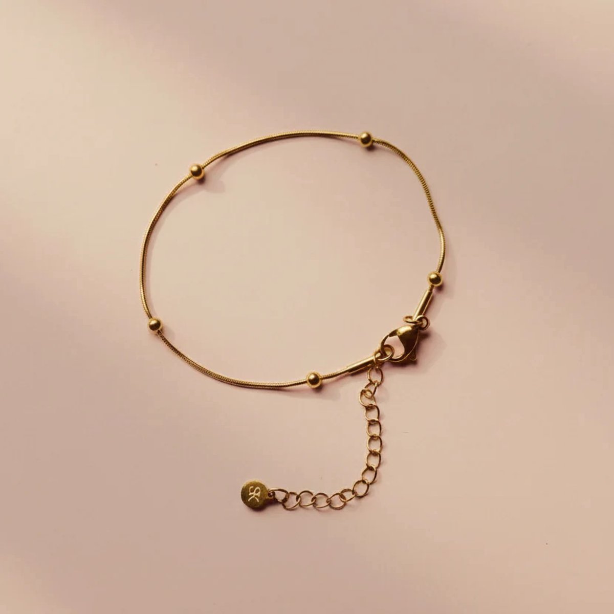 Armband goudkleurig – Bolletjes design – Stainless steel dames armband – SK Sieraden