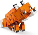 Renard LEGO Minecraft orange, marron et blanc, assis, le dos courbé.