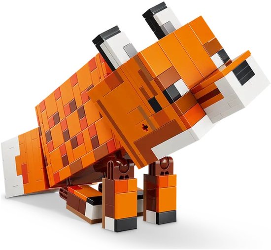 Renard LEGO Minecraft orange, marron et blanc, assis, le dos courbé.
