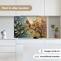 Abstract spatscherm met boom, gouden en oranje bladeren, boven een inductiekookplaat. Past in elke keuken, tot 80 cm hoog.