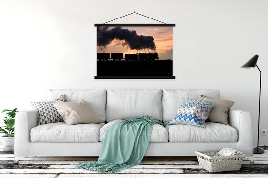 Affiche textielposter Une locomotive à vapeur au coucher du soleil 150x100 cm