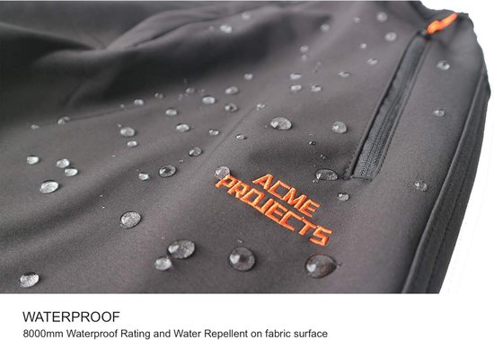Zwarte softshell broek met waterdruppels op de stof en een oranje 'ACME PROJECTS' logo.