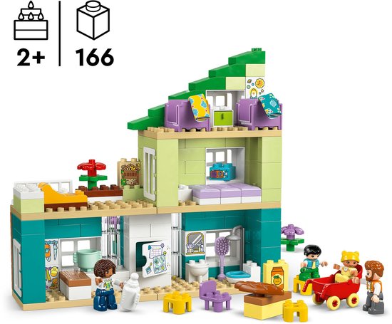 Une maison de jeu LEGO Duplo aux murs verts, violets et vert clair, avec des figurines et des accessoires.
