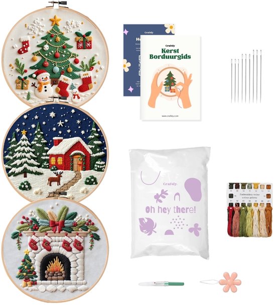 Drie kerst borduurwerken, kerst borduurgids, naalden, draad en Crafsly zak.
