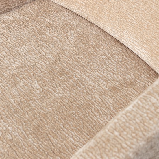 Close-up van de zitting van een beige eetkamerstoel met een structuurstof.