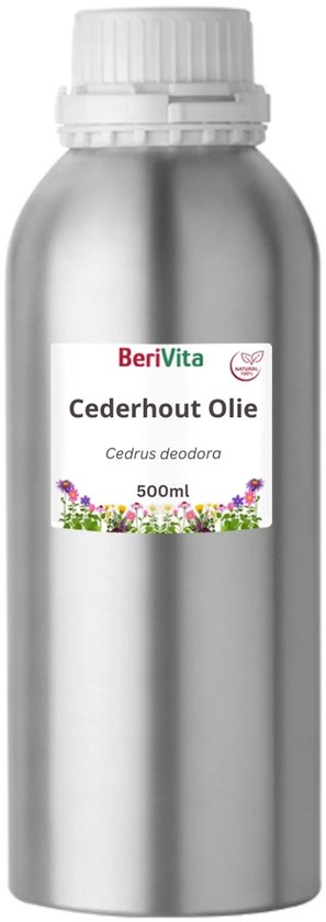 Zilverkleurige fles met witte dop en een label met 'BeriVita Cederhout Olie 500ml Cedrus deodorra' en bloemen.