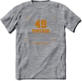 49 Jaar Legend T-Shirt | Goud - Zilver | Grappig Verjaardag Cadeau | Dames - Heren | - Donker Grijs - Gemaleerd - S
