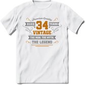 34 Jaar Legend T-Shirt | Goud - Zilver | Grappig Verjaardag Cadeau | Dames - Heren | - Wit - M