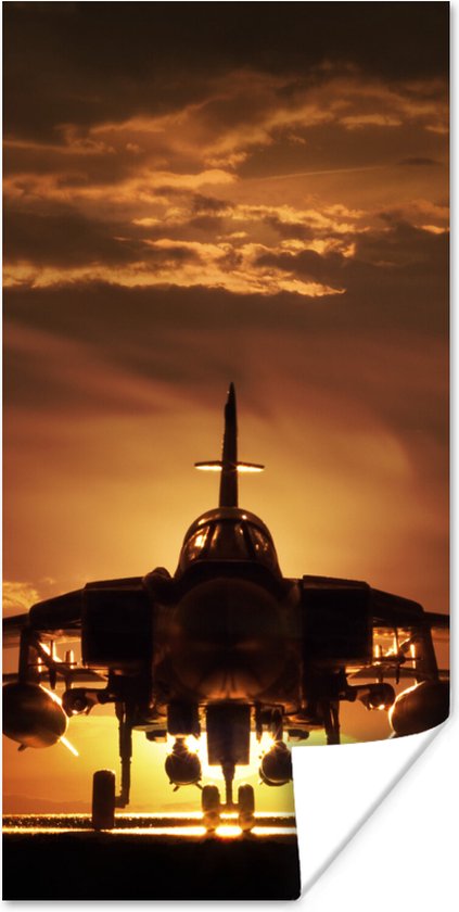 Poster Een silhouet van een straaljager tijdens een zonsondergang - 20x40 cm