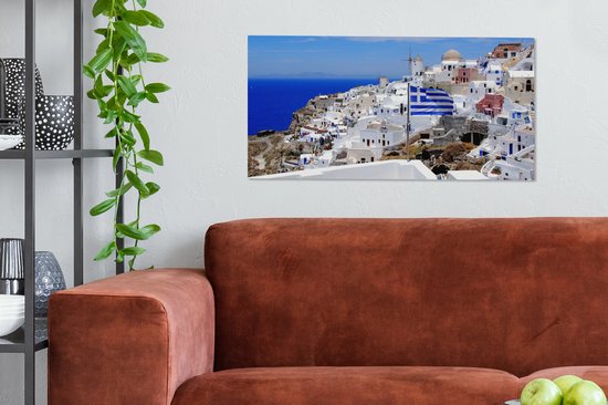 Canvas schilderij 80x40 cm - Wanddecoratie Vlag van Griekenland tussen de witte huisjes - Muurdecoratie woonkamer - Slaapkamer decoratie - Kamer accessoires - Schilderijen op canvas