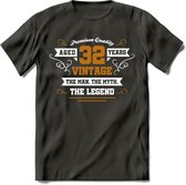 32 Jaar Legend T-Shirt | Goud - Wit | Grappig Verjaardag en Feest Cadeau Shirt | Dames - Heren - Unisex | Tshirt Kleding Kado | - Donker Grijs - L