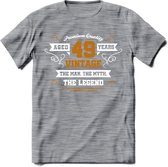 49 Jaar Legend T-Shirt | Goud - Wit | Grappig Verjaardag en Feest Cadeau Shirt | Dames - Heren - Unisex | Tshirt Kleding Kado | - Donker Grijs - Gemaleerd - M