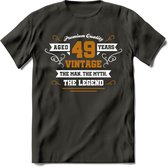 49 Jaar Legend T-Shirt | Goud - Wit | Grappig Verjaardag en Feest Cadeau Shirt | Dames - Heren - Unisex | Tshirt Kleding Kado | - Donker Grijs - XL