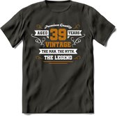 39 Jaar Legend T-Shirt | Goud - Wit | Grappig Verjaardag en Feest Cadeau Shirt | Dames - Heren - Unisex | Tshirt Kleding Kado | - Donker Grijs - M