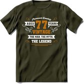 77 Jaar Legend T-Shirt | Goud - Wit | Grappig Verjaardag en Feest Cadeau Shirt | Dames - Heren - Unisex | Tshirt Kleding Kado | - Leger Groen - M