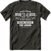 34 Jaar Legend T-Shirt | Zilver - Wit | Grappig Verjaardag en Feest Cadeau | Dames - Heren - Unisex | Kleding Kado | - Donker Grijs - S