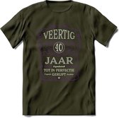 40 Jaar Legendarisch Gerijpt T-Shirt | Paars - Grijs | Grappig Verjaardag en Feest Cadeau Shirt | Dames - Heren - Unisex | Tshirt Kleding Kado | - Leger Groen - XL