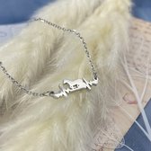 Fashionvibe.nl - Paardenhartslag armband - Zilverkleurige RVS Armband met mooi verfijnd hartslag lijntje en sierlijk galopperend paard.