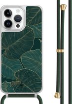 Casimoda® hoesje met groen koord - Geschikt voor iPhone 14 Pro Max - Monstera Leaves - Afneembaar koord - TPU/polycarbonaat - Zwart