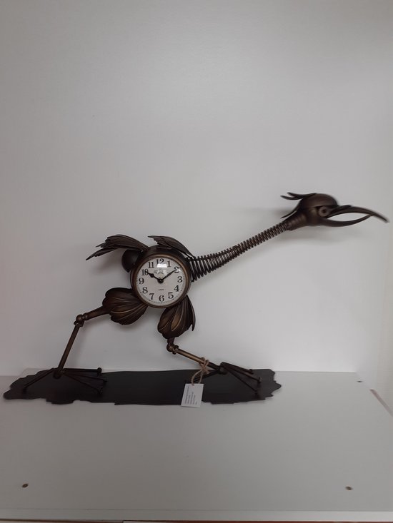 Klok grote vogel zwart/brons kleur klok groot en zwaar 3200gr.metaal lopende vogel 45 x 60 x 17 cm