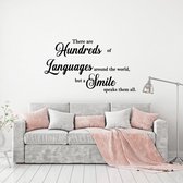 Muursticker There Are Hundreds Of Languages Around The World But A Smile - Zwart - 80 x 46 cm -  woonkamer engelse teksten