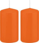 2x Oranje cilinderkaarsen/stompkaarsen 5 x 10 cm 23 branduren - Geurloze kaarsen oranje - Woondecoraties