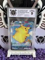 Afbeelding van het spelletje Pokemon Kaarten - Surfing Pikachu Vmax - Grade 9 - Grading In Valhalla - 25th Anniversary JPN
