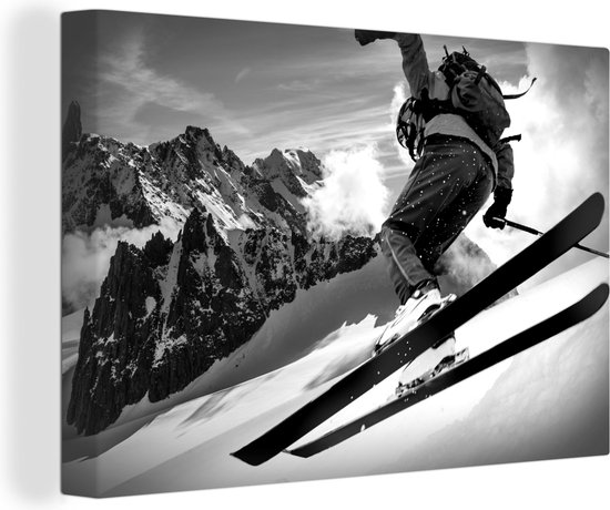 Canvas Schilderij Een skiër maakt een bocht op de Mont Blanc - zwart wit - 90x60 cm - Wanddecoratie