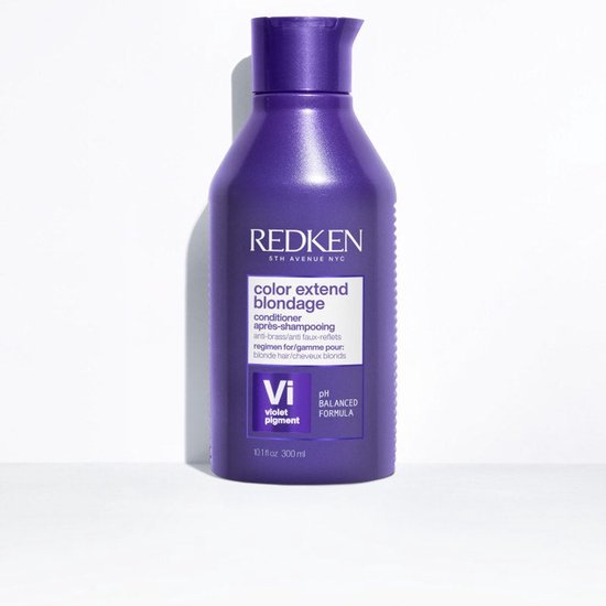 Bouteille violette de revitalisant Redken Color Extend Blondage avec un couvercle à rabat.