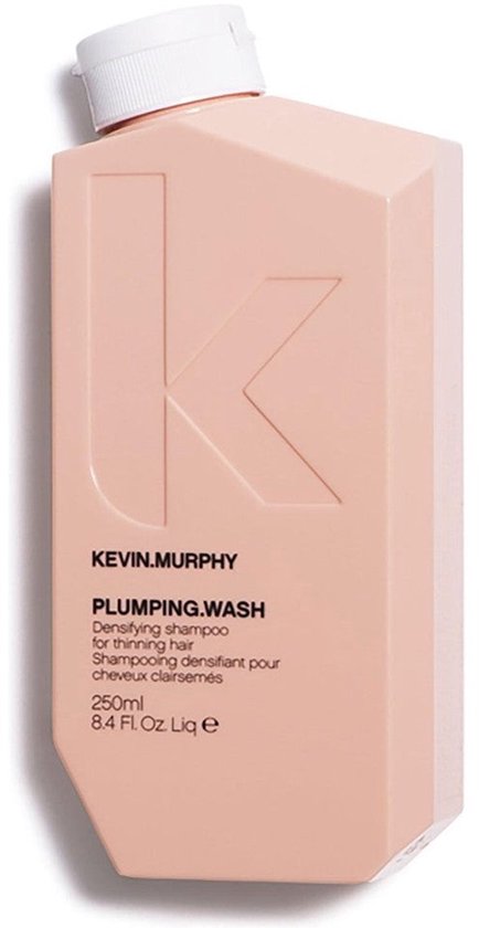 KEVIN.MURPHY PLUMPING.WASH fles van 250 ml in perzikkleur met een witte dop. "Densifying shampoo for thinning hair" is gedrukt op de voorkant.