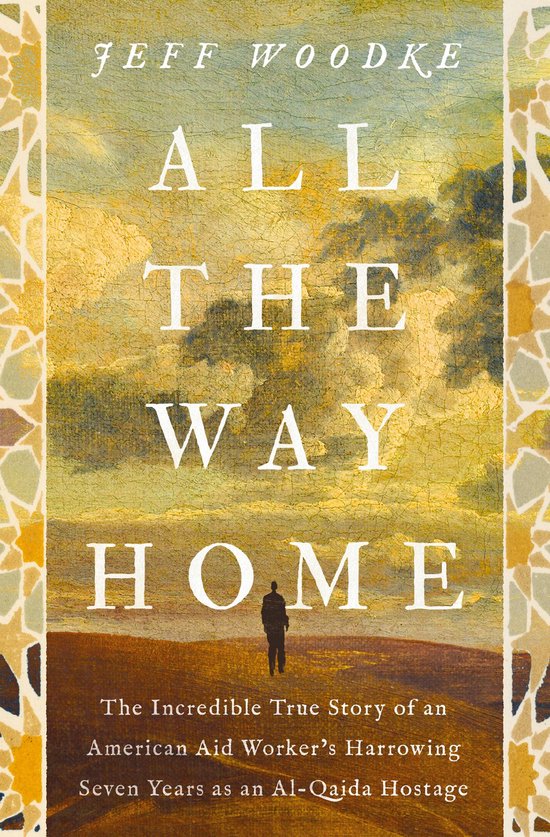 Boek 'All The Way Home' van Jeff Woodke met op de kaft een persoon die alleen in een landschap staat. De tekst 'All The Way Home' staat centraal.