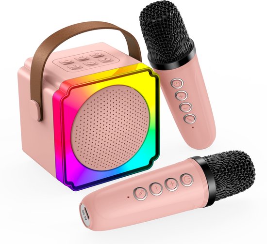 Roze draagbare speaker met gekleurde LED-rand en twee roze microfoons ernaast.