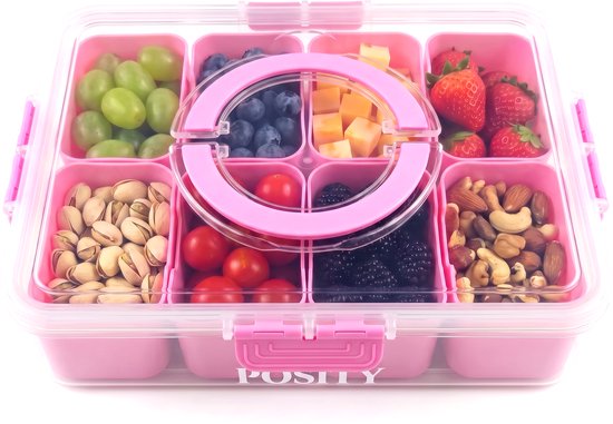 Boîte à snacks rose avec couvercle transparent, remplie de raisins, myrtilles, dés de fromage, fraises, cerises, mûres et noix.