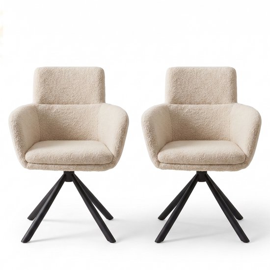 Set van twee licht beige teddy stof eetkamerstoelen met draaibare zwarte metalen frame poten.