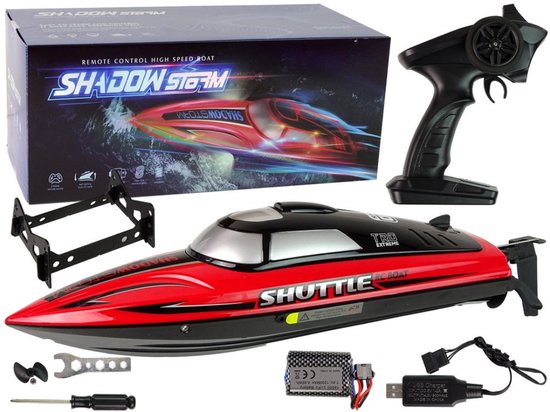 Compleet RC-bootpakket: rode boot 'SHADOWSTORM', afstandsbediening, batterij, lader, standaard en gereedschap.