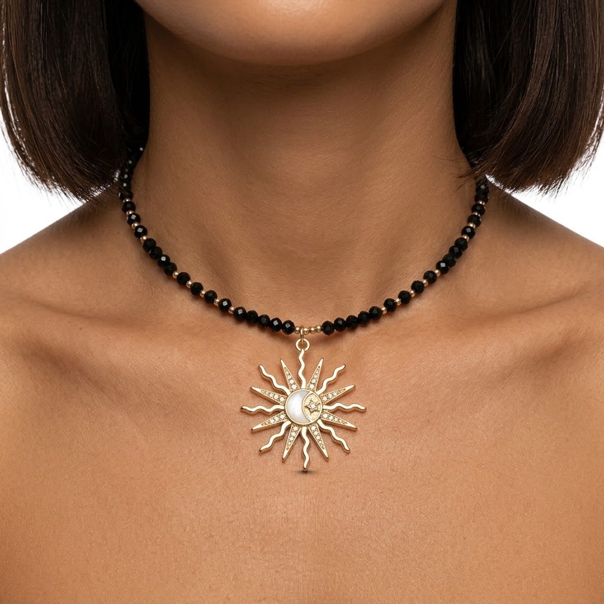 Zwart goudkleurig kralenketting voor dames met zon- en maanhanger – chokerstijl met goudkleurig accent